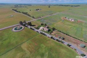 aerial view of Sacramento area home and equestrian center for sale