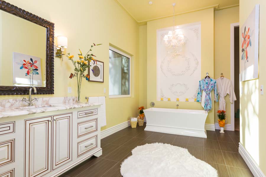 Yellow master bathroom on Adams Road brings the feng shui element of happiness