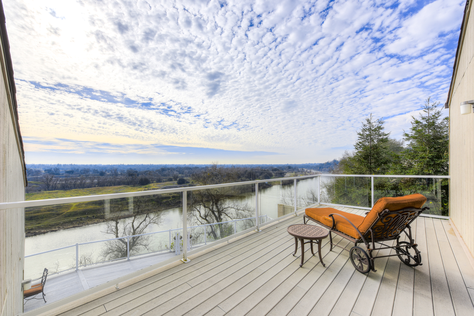 Relax on the wood deck along the American River 